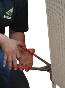 A plumber working on some pipes